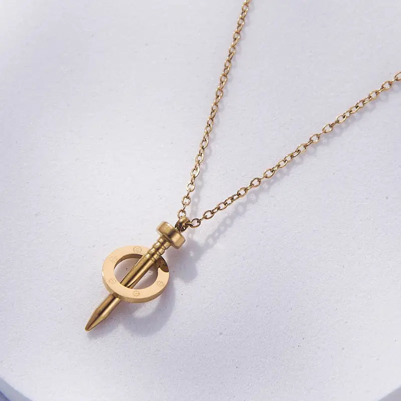 COLLIER MODÈLE CLOU EN OR