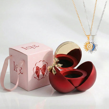BOITE SPHÈRE MAGIQUE ROUGE AVEC COLLIER SOLEIL ET LUNE