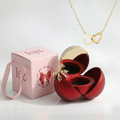 BOÎTE LA SPHÈRE MAGIQUE ROUGE AVEC COLLIER DOUBLE CŒUR